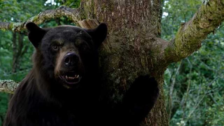 COCAINE BEAR Review: "Elizabeth Banks Makes It Snow In Bloody, But Surprisingly Heartfelt Action Comedy"